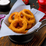 Air fryer onion rings are a delicious and healthier alternative to traditional deep-fried onion rings. these air fryer onion rings are crispy and tender.